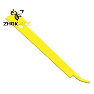 J shape yellow hive tool